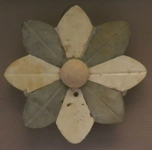 Two four-point crosses intersecting each other resembling flowers